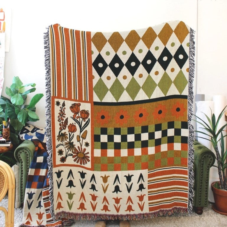 Calhoun & Co dandy daffodil tapestry blanket at Clad, a sustainable clothing boutique in Asheville, NC
