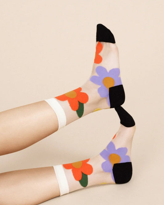 Hansel from Basel's sheer floral crew socks at Ckadm, a sustainable clothing sore in Asheville, North Carolina.