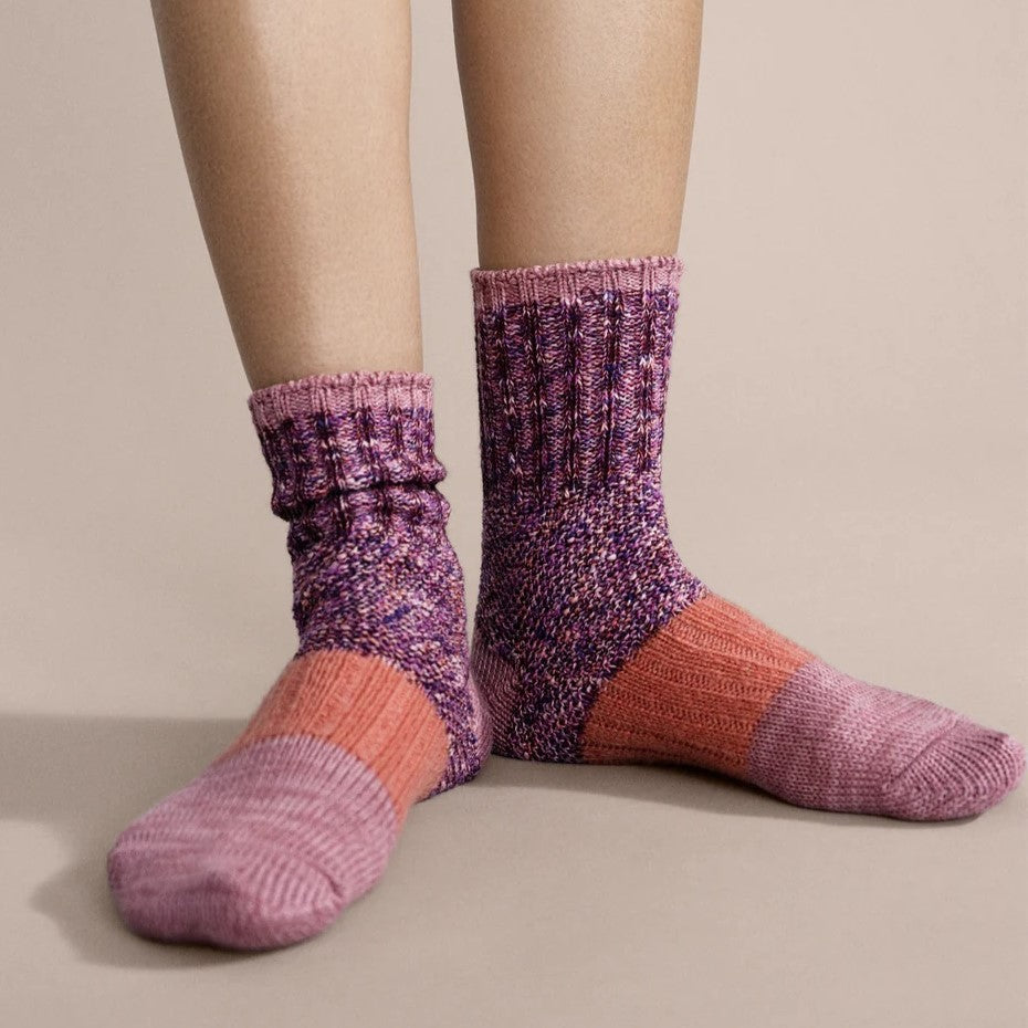 Pixie dapple crew socks with muave, coral, and lilac, eggplant, lavender purple wool socks from Hansel from Basel at Clad, a sustainable clothing store in Asheville, NC.