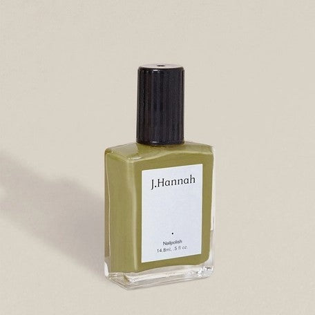Non-toxic, cruelty-free nail polish in a muted chartreuse Eames green.