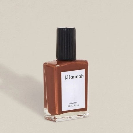 Non-toxic, cruelty-free terracotta nail polish in a rust brown Ghost Ranch.