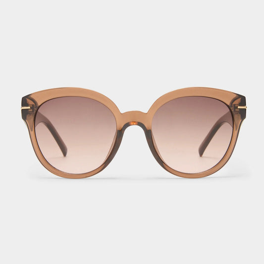 Capacious hocolate sunglasses from Le Specs at Clad, a sustainable clothing store in Asheville, NC