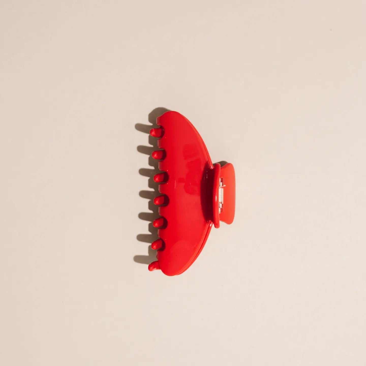 Cherry Hair Claw from Nat & Noor at Clad, a sustainable clothing store in Asheville, NC