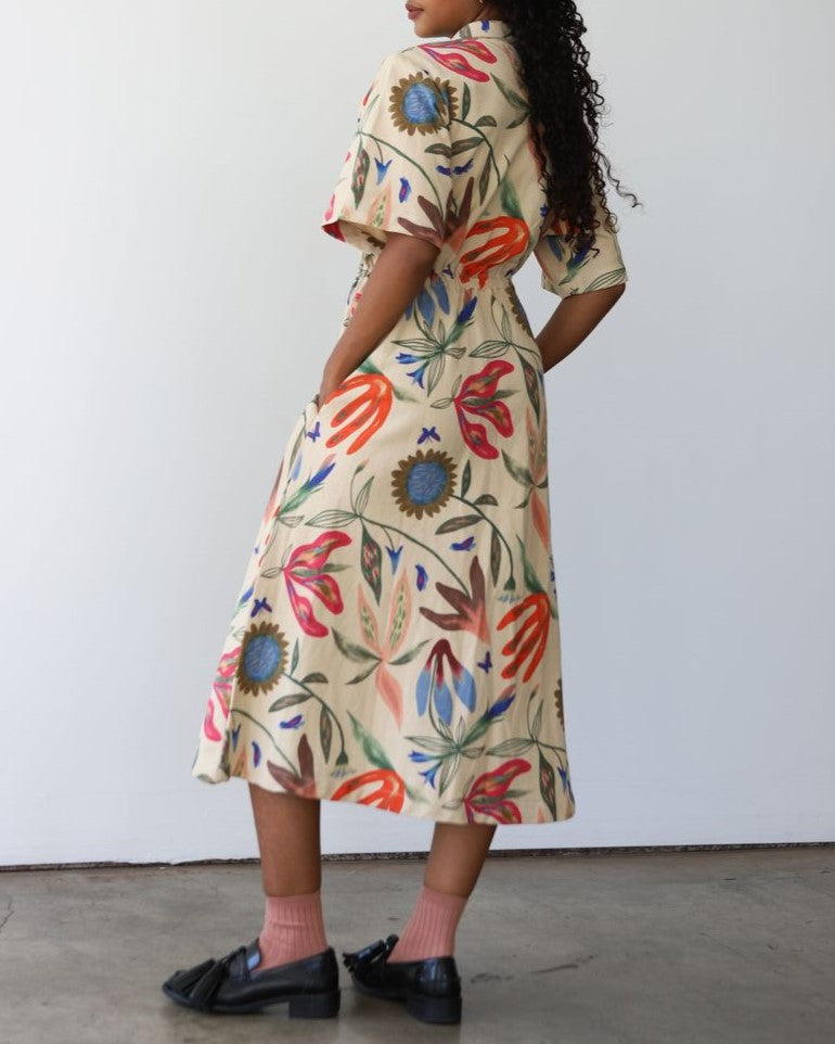 Noble Laura Burke long utility dress paired with ribbed socks and loafers