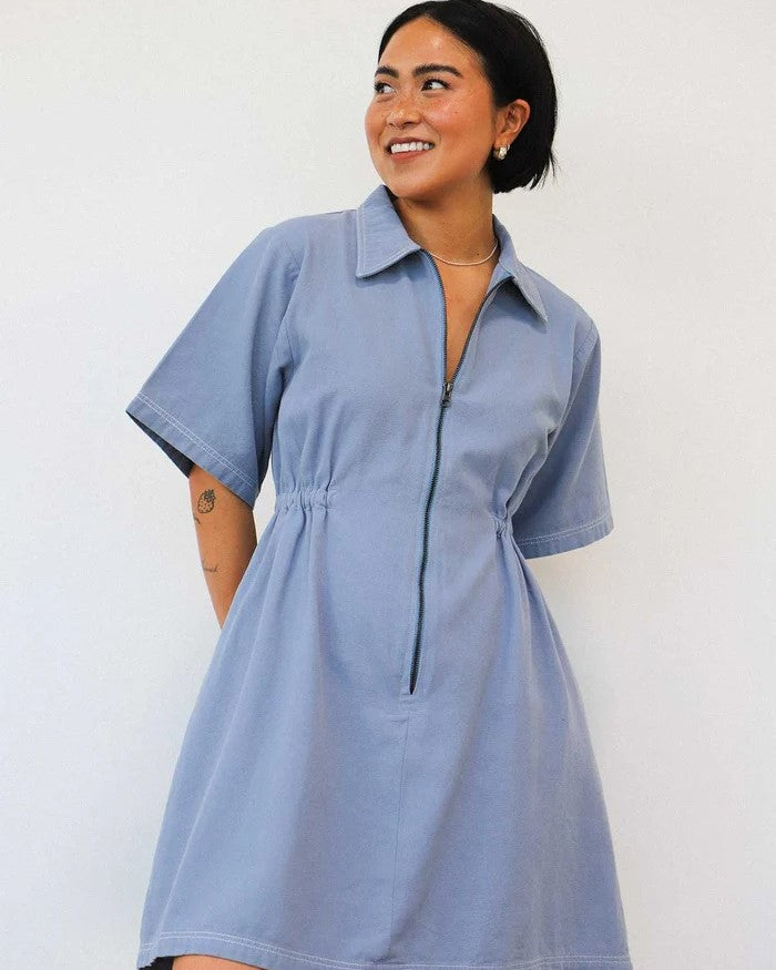 Utility dress with contrast stitch in pebble blue by Noble at Clad, a sustainable clothing store in Asheville, NC
