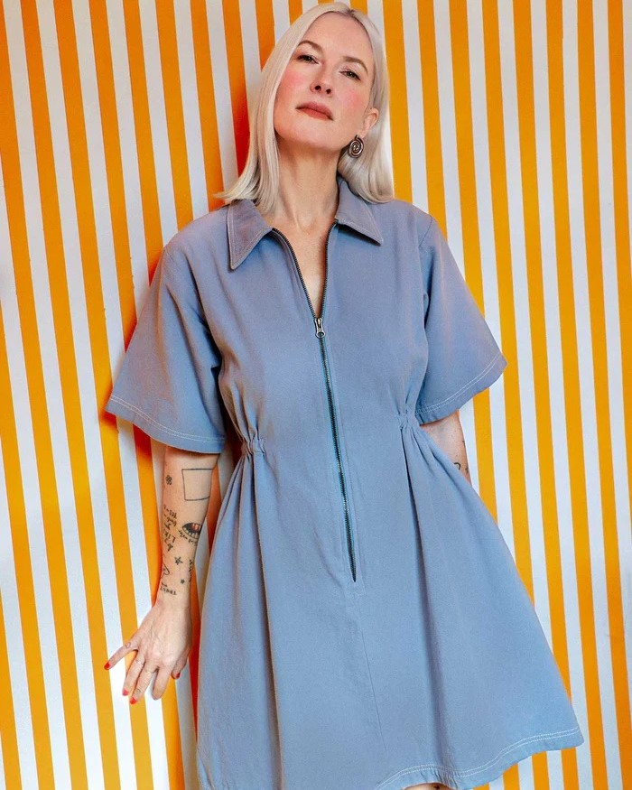 Utility dress with contrast stitch in pebble blue by Noble at Clad, a sustainable clothing store in Asheville, NC