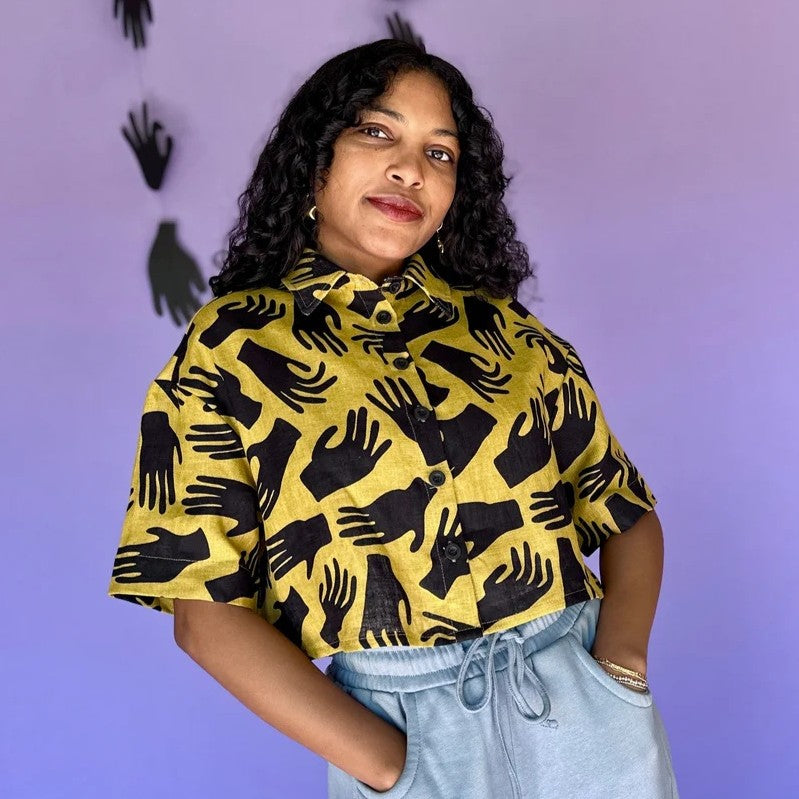 Nooworks Olivia Top in Hands. Chartreuse linen with black hand pattern