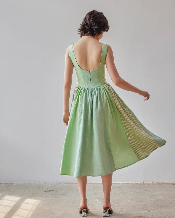 Violet Dress in green patchwork from Oh Seven Days at Clad, a sustainable clothing boutique in Asheville, NC