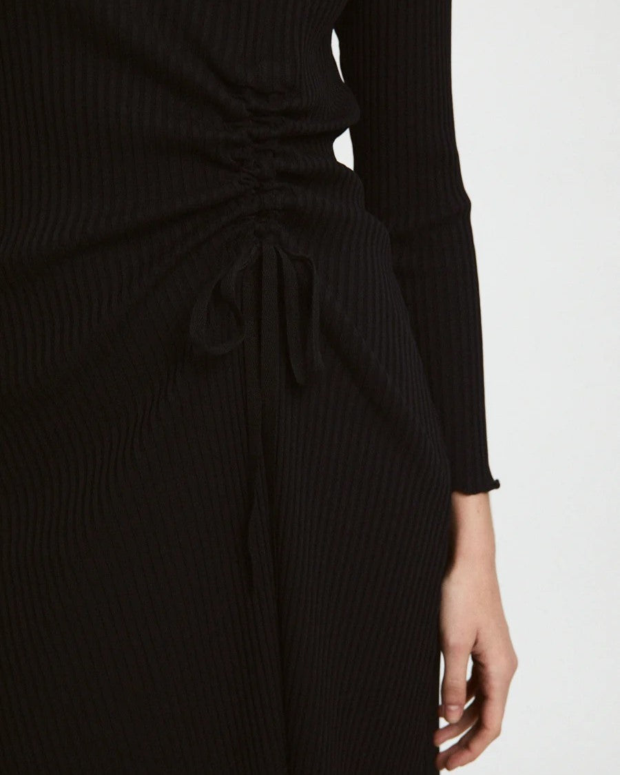 Black ribbed knit Evans Dress from Rita Row at Clad, a sustainable clothing boutique in Asheville, NC.