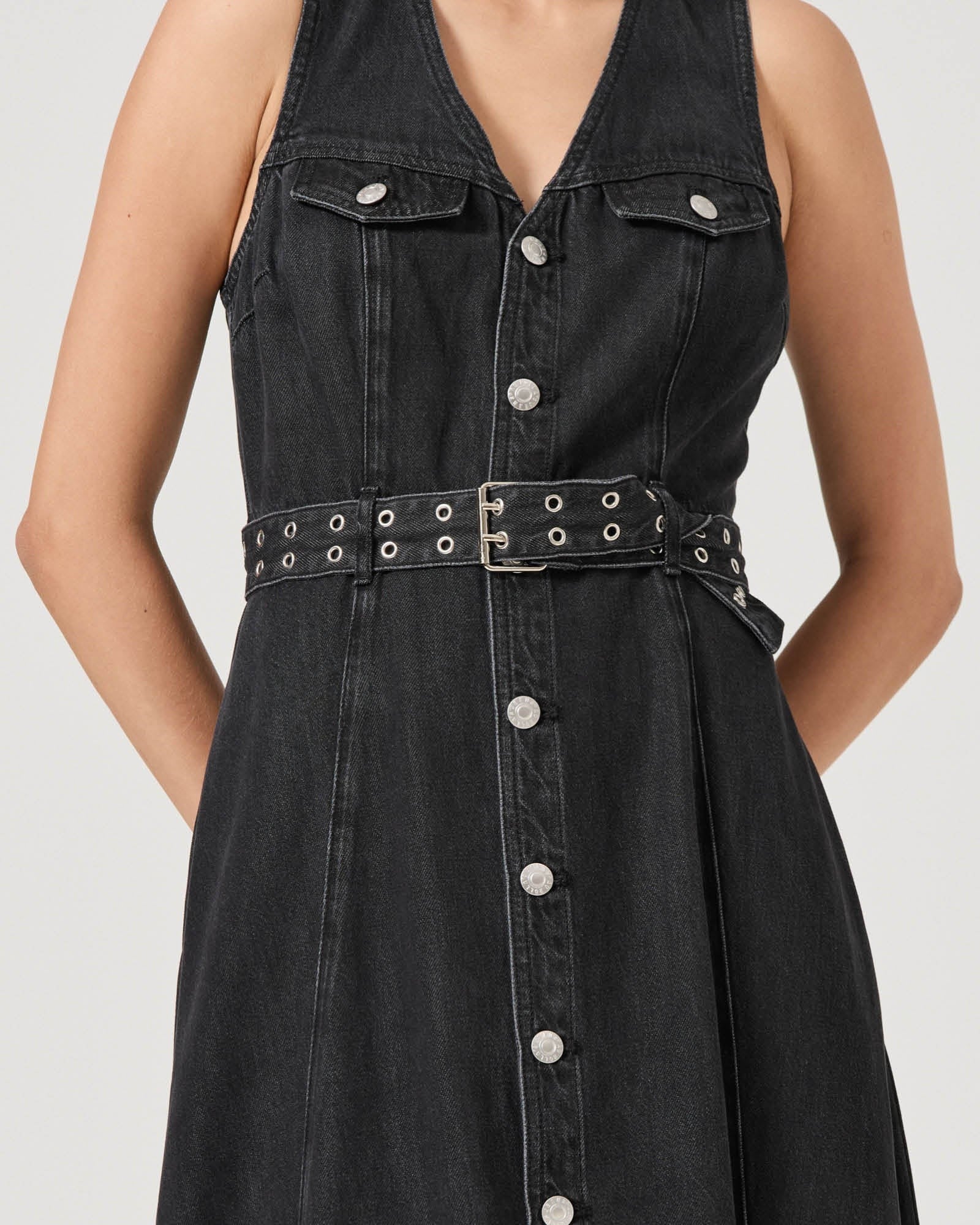 Angelica black sand denim dress with a button down front and eyelet belt at the waist