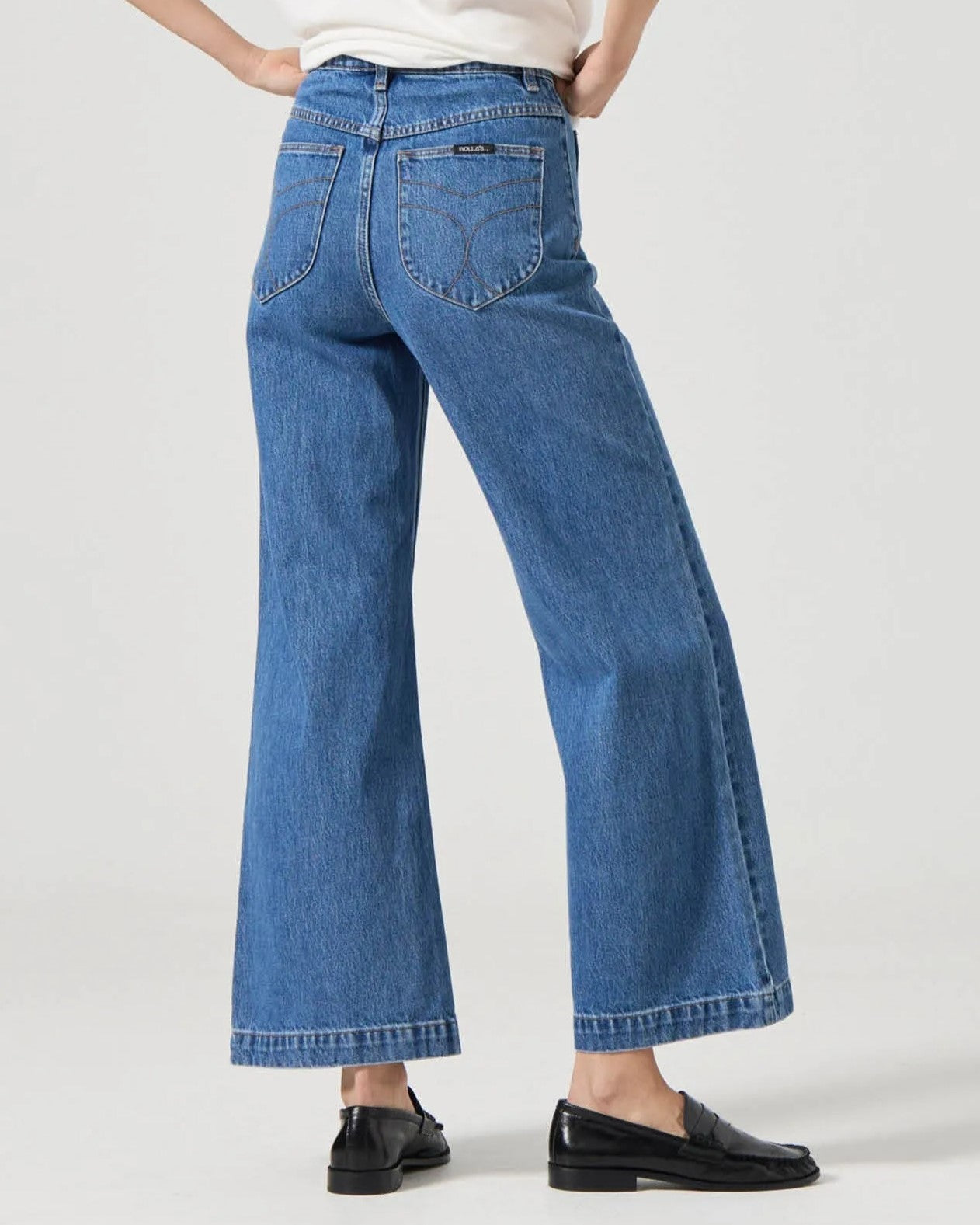 Rolla's Ashley blue sailor jean paired with a white tee and black leather loafers