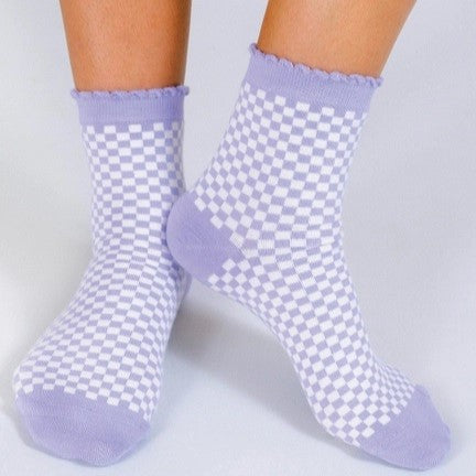 Lavender and white checker print sock with scallop ruffle edge.
