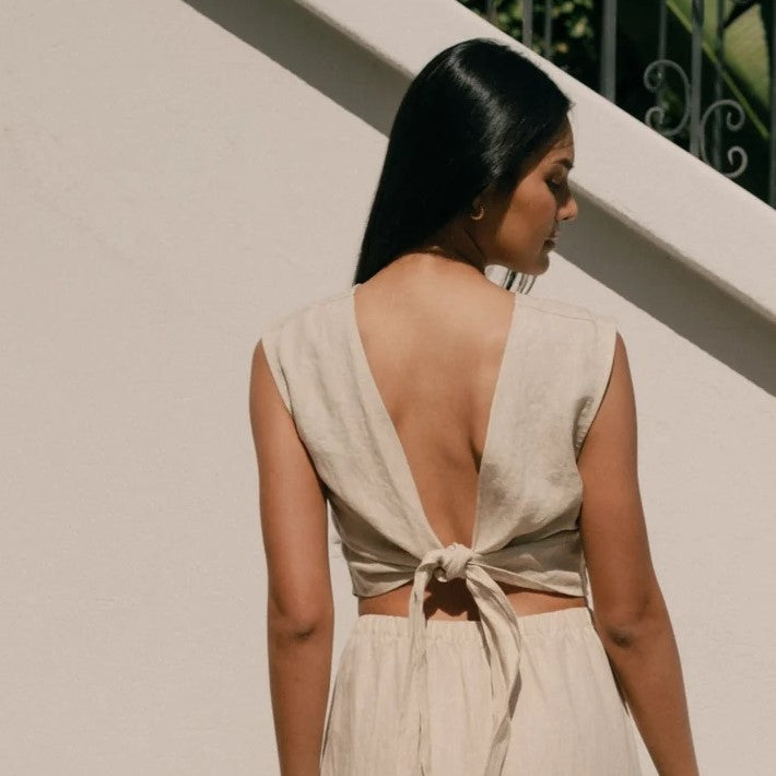 A reversible linen wrap top in beige oatmeal.