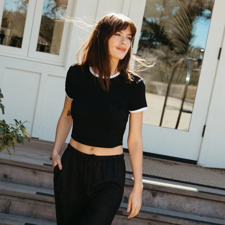 Whitney Top fitted cotton baby tee by Whimsy & Row in blackwith white trim neckline and sleeves