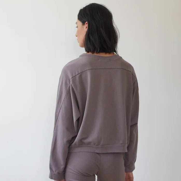 The Easy Summer Sweatshirt from sustainable brand Wol Hide in cotton with lightweight French terry. Wide hem, crew neck, mushroom light brown taupe hue.