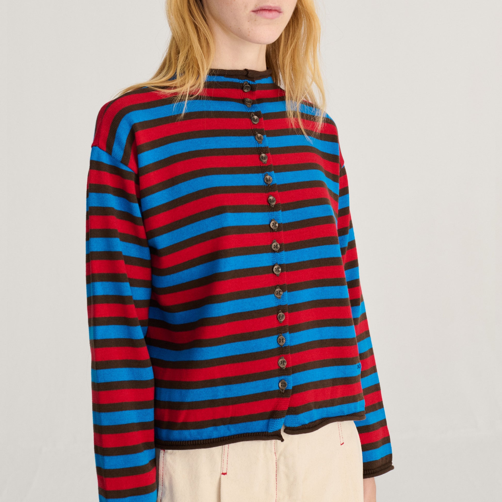 Striped red, blue, and brown cotton cardigan by Bobo Chooses