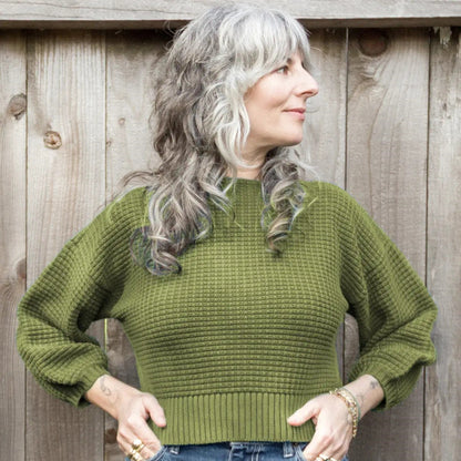 Curator Clove sweater in avocado green at Clad, a sustainable clothing boutique in Asheville, NC