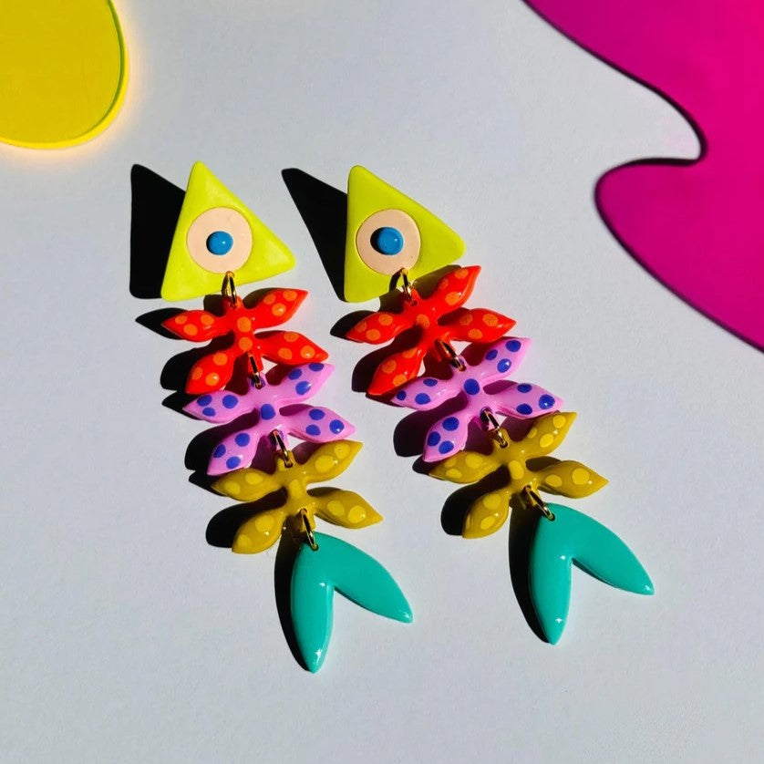 Collorful fish bone earrings by Delaney and Blue at Clad, a sustainable clothing store in Asheville, NC