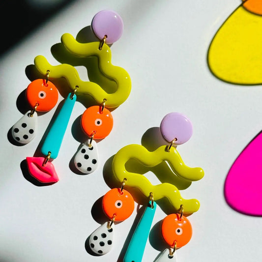Silly Willies abstract face polymer clay earrings by Delaney & Blu at Clad, a sustainable clothing store in Asheville, NC