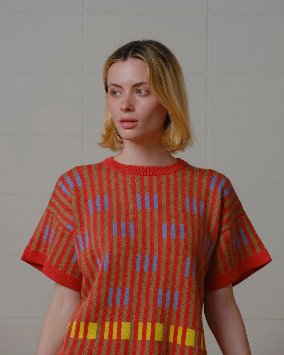 The Endery Bauhaus short sleeve sweater tee in poppy orange with lavender detail