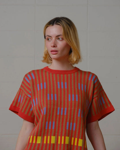 The Endery Bauhaus short sleeve sweater tee in poppy orange with lavender detail