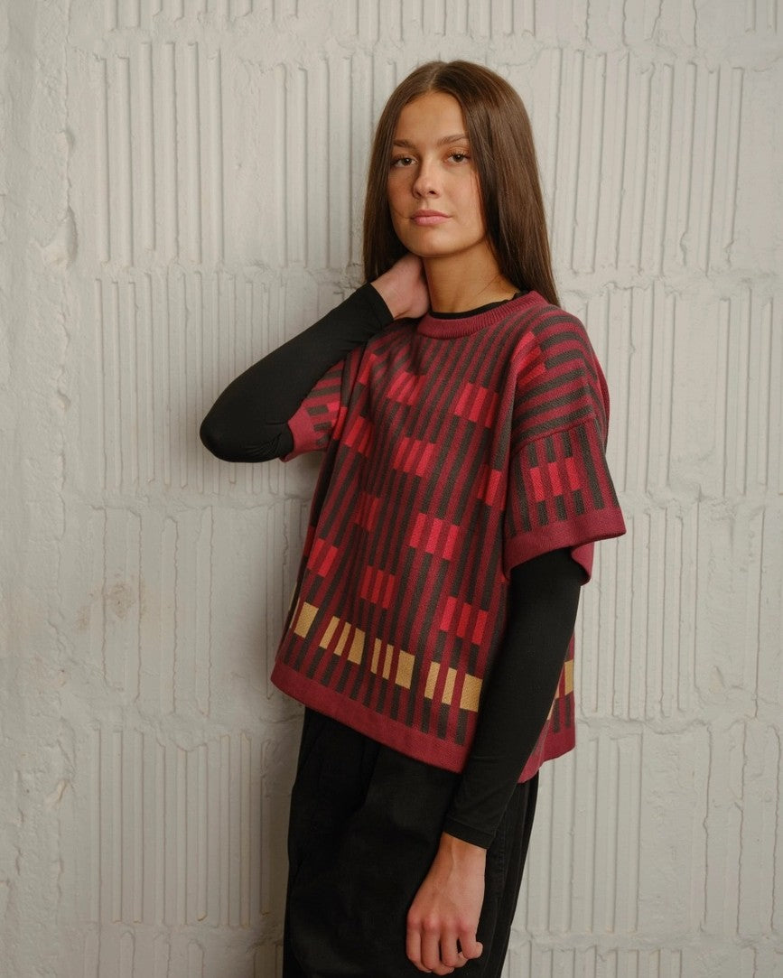 The Endery Bauhau short sleeve sweater in ruby burgundy red with olive green and dijon yellow