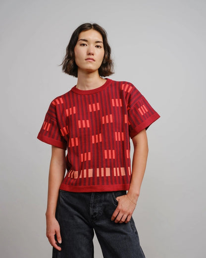 Endery Bauhaus short sleave sweater tee in Solsitce red, orange, and burgundy