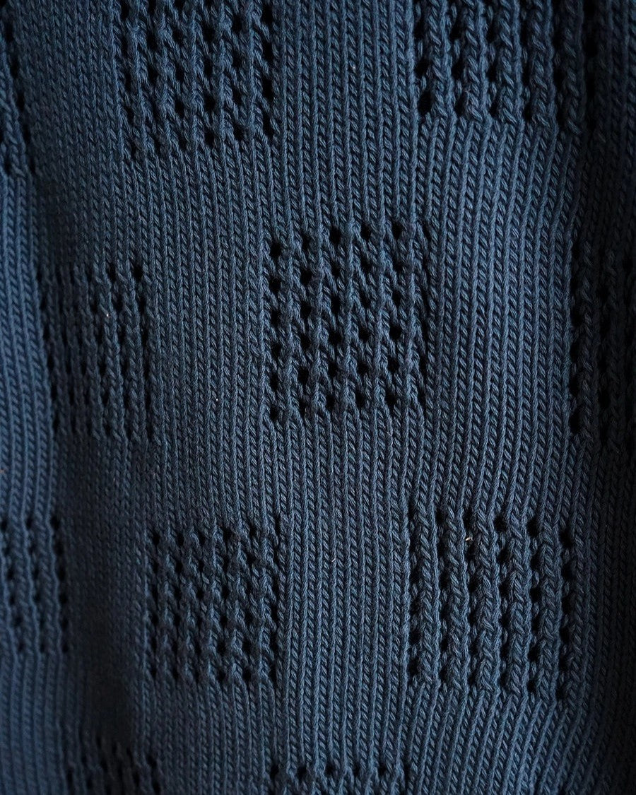 The Endery knit sweater Katt vest in Viridian deep blue with eyelet stitch