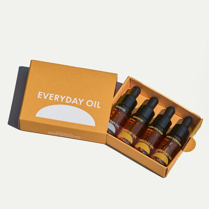 Everyday Oil sample pack mini bottles of Baseline, Mainstay, Early Morning, and Warm Feelings
