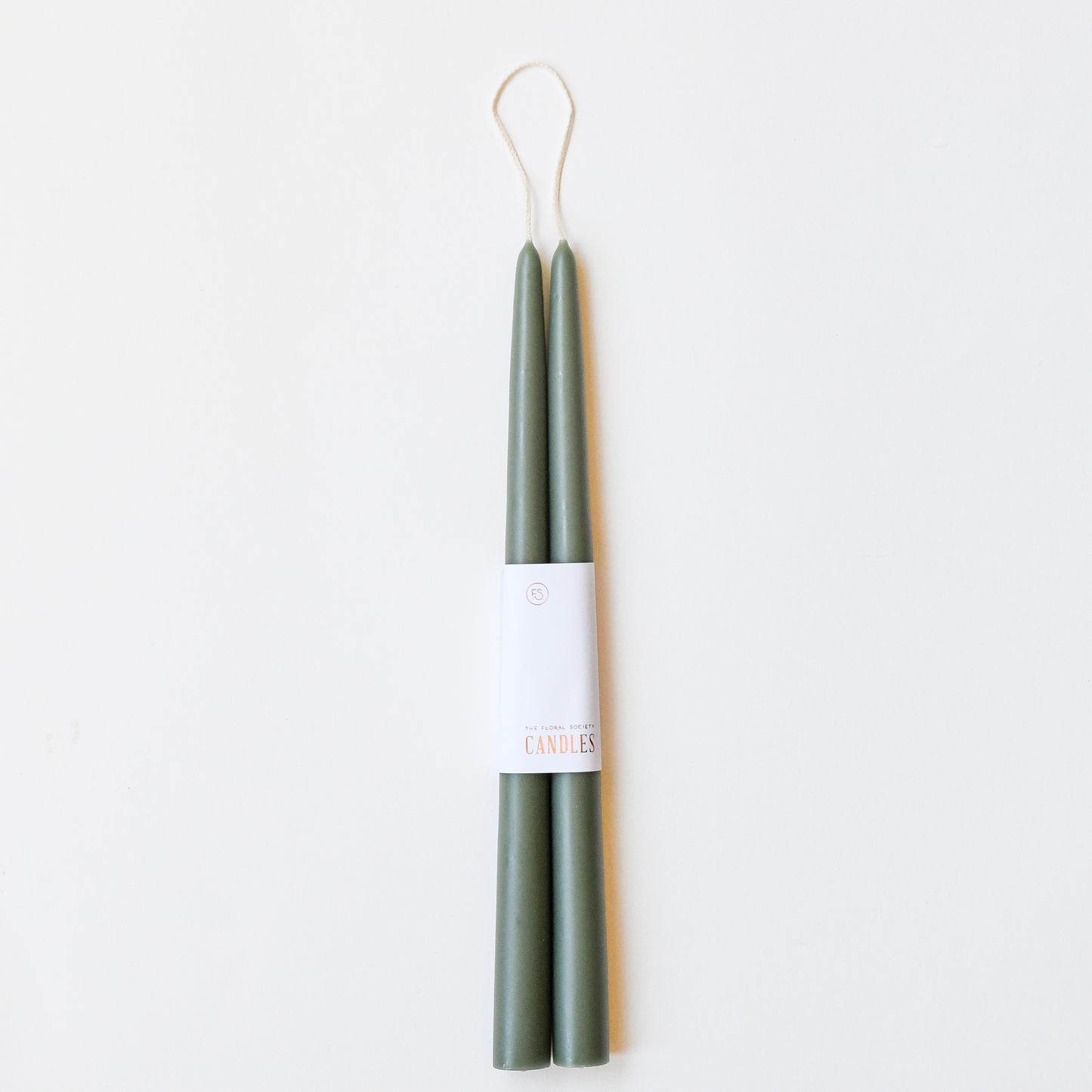 12" taper candles in a set of two in moss green.