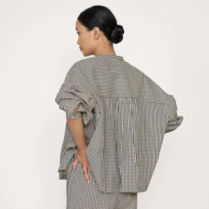 Francoise black and white checkered gingham top from Laude the Label. Button down. At Clad, a sustainable clothing boutique in Asheville, NC.