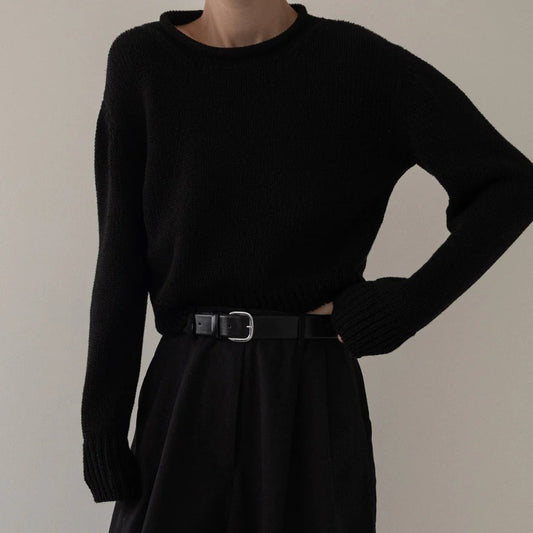 Black Mare Rolled Neck Sweater by Laude the Label. Paired with black wide leg trousers and a black leather belt.