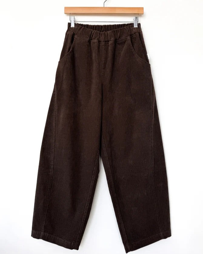 Chocolate brown corduroy barrel arc pants from Le Bon Shoppe at Clad, a sustainable slow fashion clothing boutique in Asheville, NC