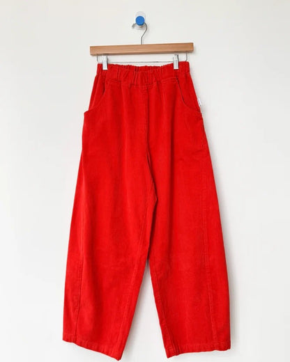 Red orange flame corduroy arc pants by Le Bon Shoppe at Clad, a sustainable clothing store in Asheville, NC