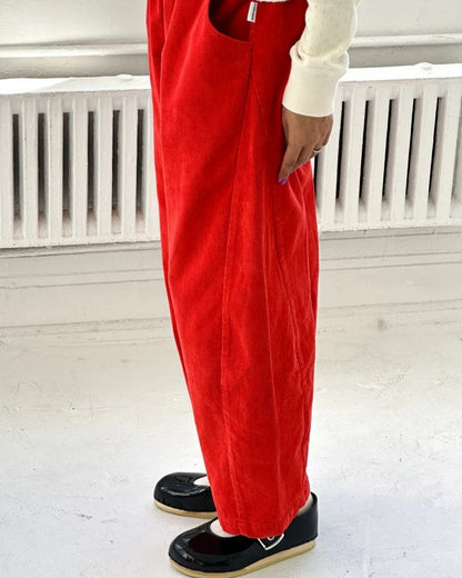 Red orange flame corduroy arc pants by Le Bon Shoppe at Clad, a sustainable clothing store in Asheville, NC