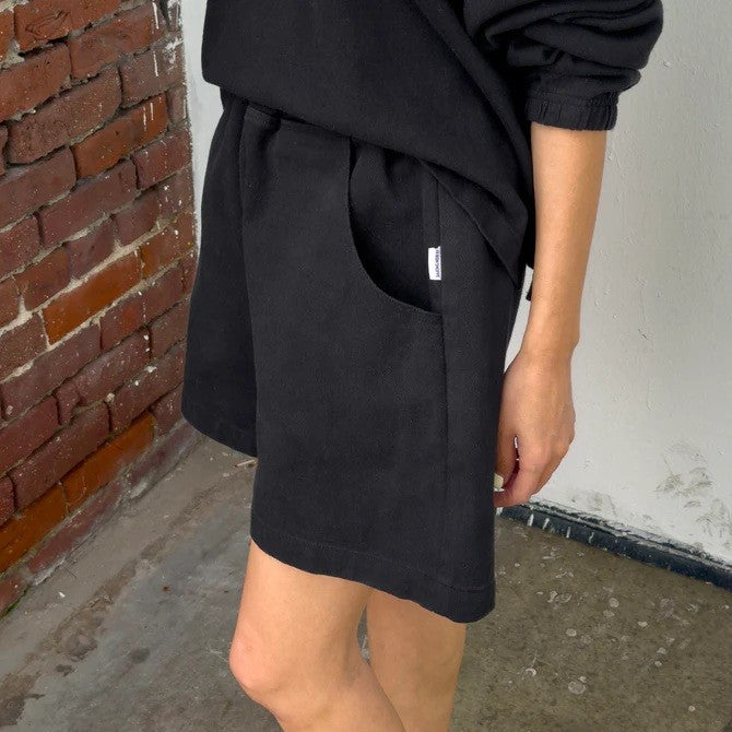 Black cotton cavas elastic high waisted city shorts by Le Bon Shoppe