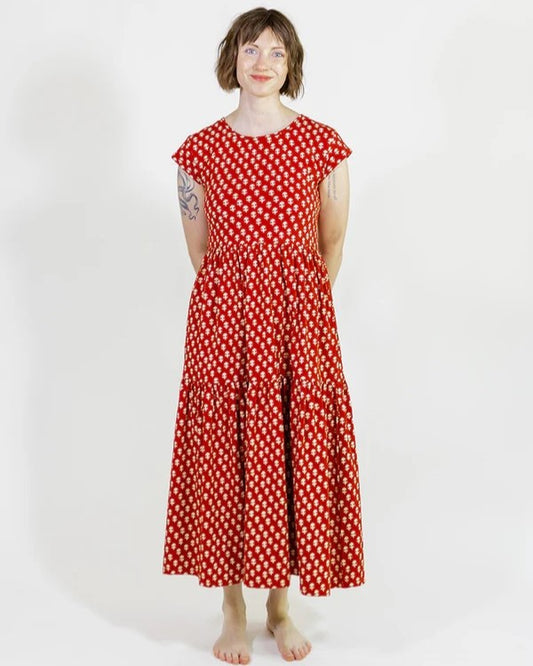 Red floral tiered midi dress by Mata Traders at Clad, a sustainable clothing boutique in Asheville, NC