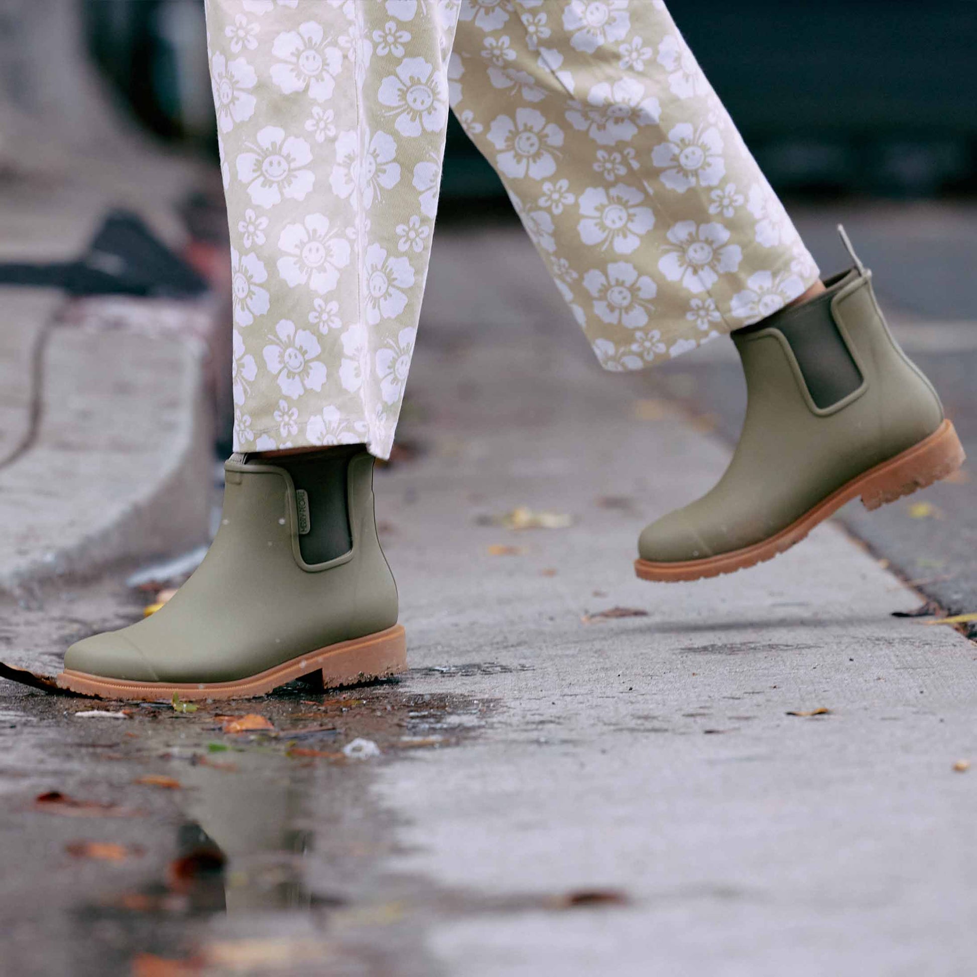 Khaki olive green Bobbi Rain Boot by Merry People at Clad, a sustainable clothing boutique in Asheville, North Carolina.