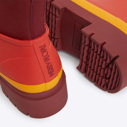 Tully Rain Boot platfrom in grapefruit by Merry People at Clad, a sustainable clothing shop in Asheville, NC