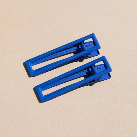 Cobalt blue hair clips from Nat + Noor at Clad, a sustainable clothing store in Asheville, NC