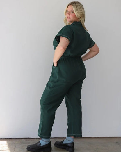 Noble Utility Suit in hunter green with white contrast stitch