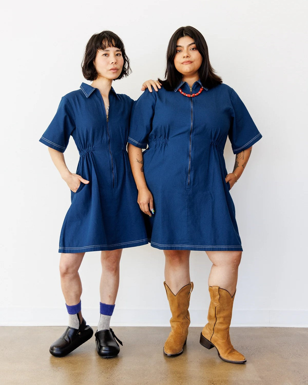 Noble utility dress in Navy with white contrast stitching