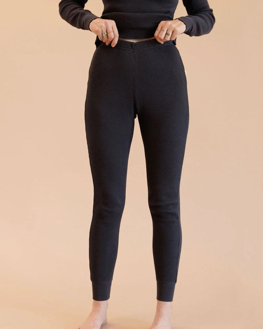 Noble waffle bottoms thermal pants in black at Clad, a sustainable clothing store in Asheville, NC