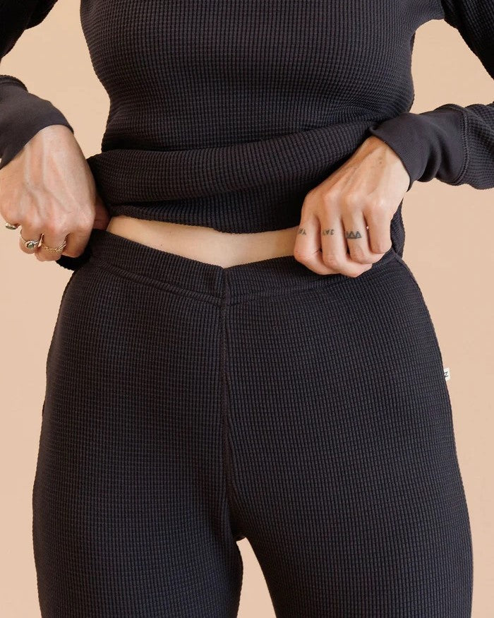 Noble waffle bottoms thermal pants in black at Clad, a sustainable clothing store in Asheville, NC