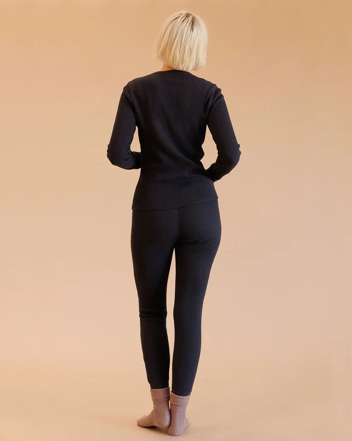 Noble waffle bottoms thermal pants in black at Clad, a sustainable clothing store in Asheville, NC