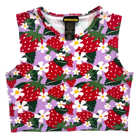 A stretchy sleeveless berries summer tank in red and lilac lavender with strawberries and floral flowers. Made in California by women-owned business Nooworks.