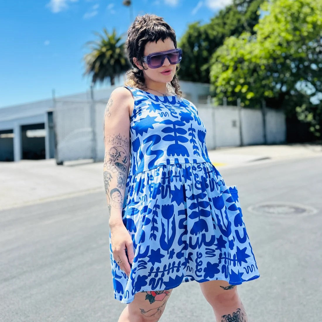 Blue and white abstract floral pattern Dutch Garden in a mini loose Big Pocket Dress by woman-owned brand Nooworks in California.