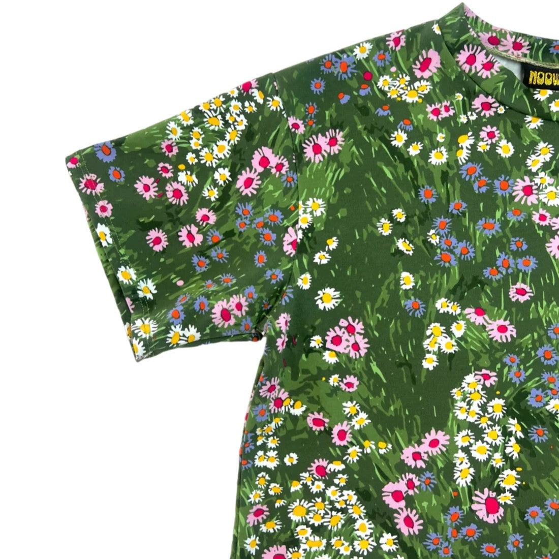 A stretchy floral crop top in a meadow print. Made in California by women-owned business Nooworks.