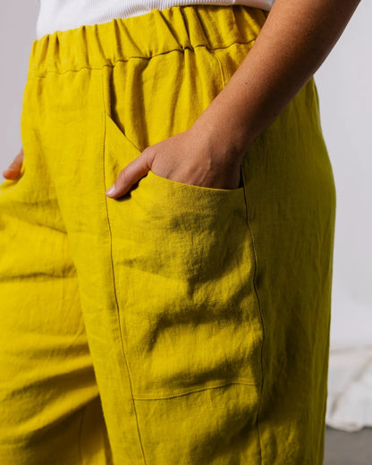 Pamur river pant in citron chartreuse yellow green with an elastic waist and deep pockets