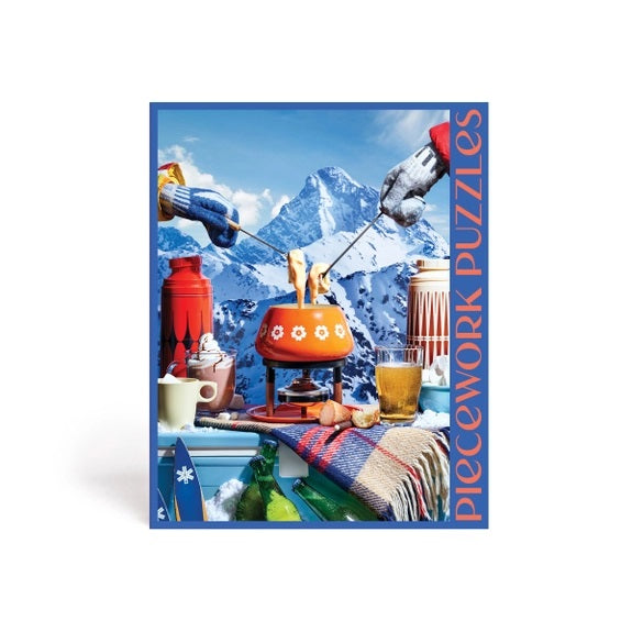 Apres-Ski 1000 piece puzzle by Piecework Puzzles. Snow mountain scene with ski mitts over a fondue.